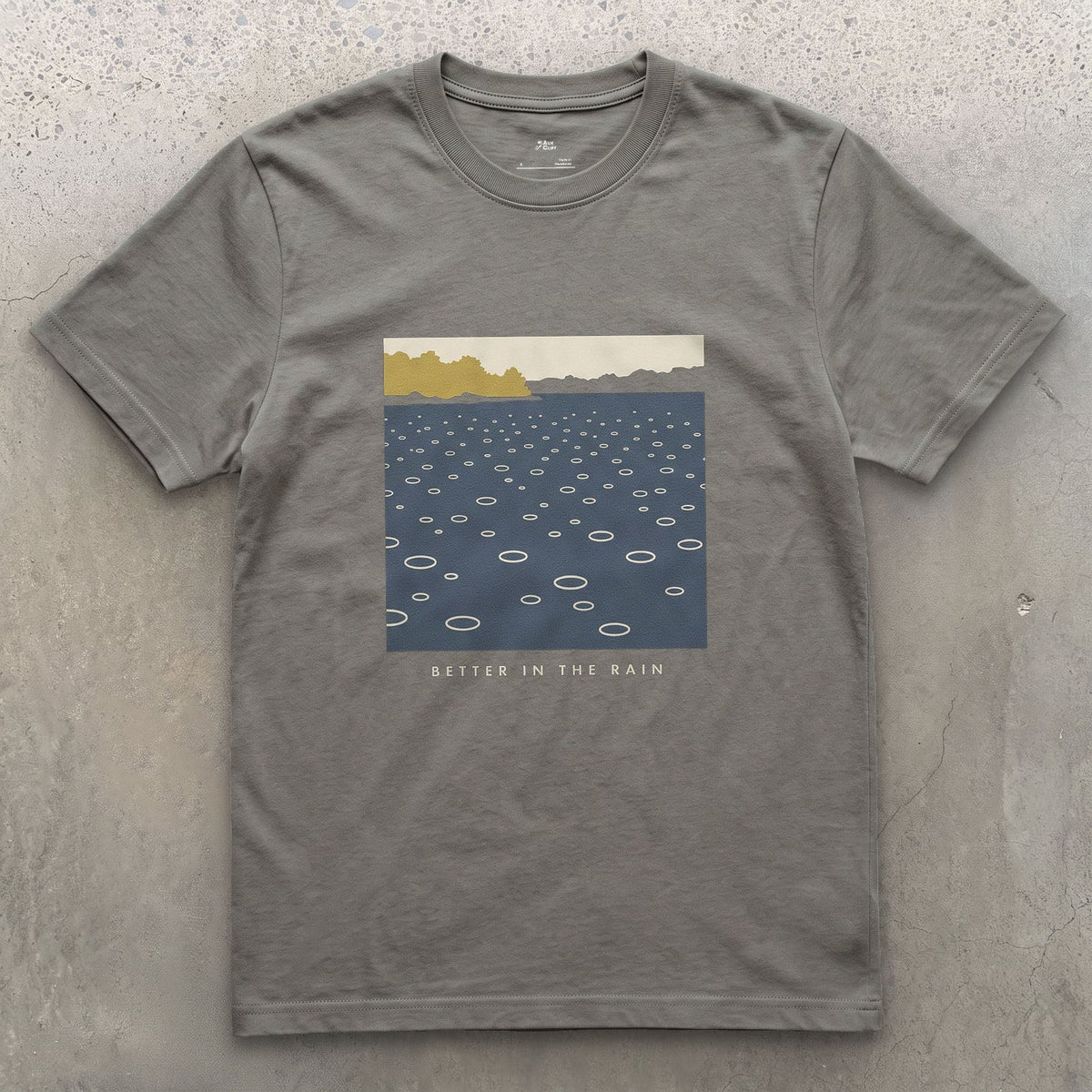 Better in the Rain Over the River design on a Charcoal Gildan Softstyle t-shirt