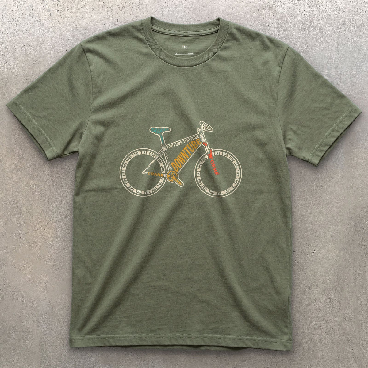 A Bike Built From the Names of Its Own Parts design on a Military Green Gildan Softstyle t-shirt