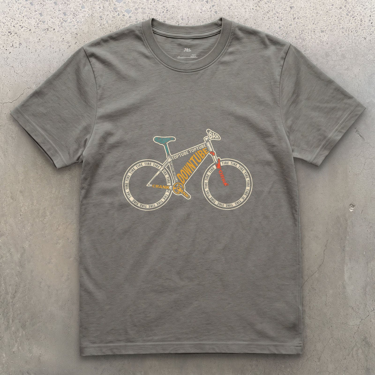 A Bike Built From the Names of Its Own Parts design on a Charcoal Gildan Softstyle t-shirt