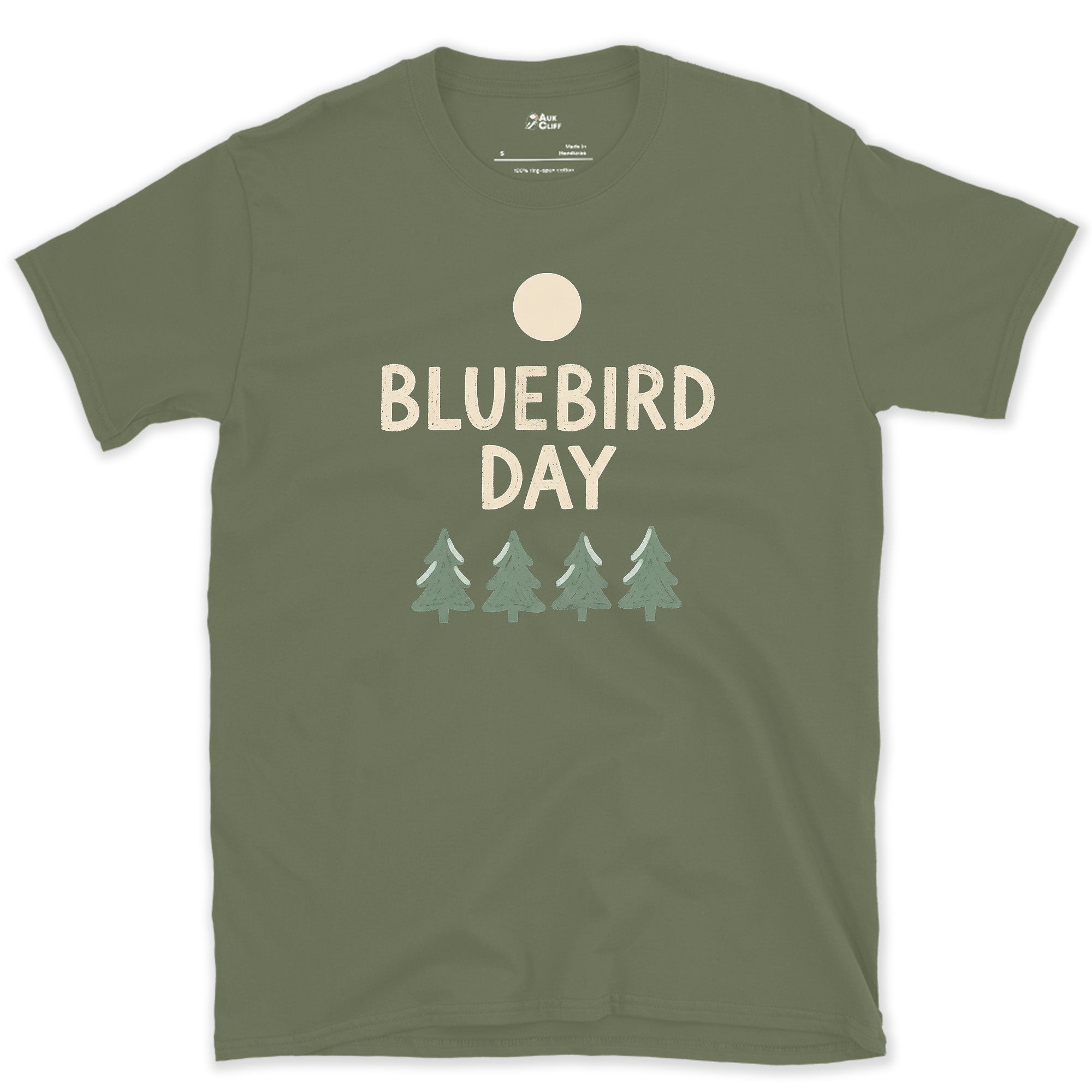 Bluebird Day, Moonrise Over the Pines design on a Military Green Gildan Softstyle t-shirt