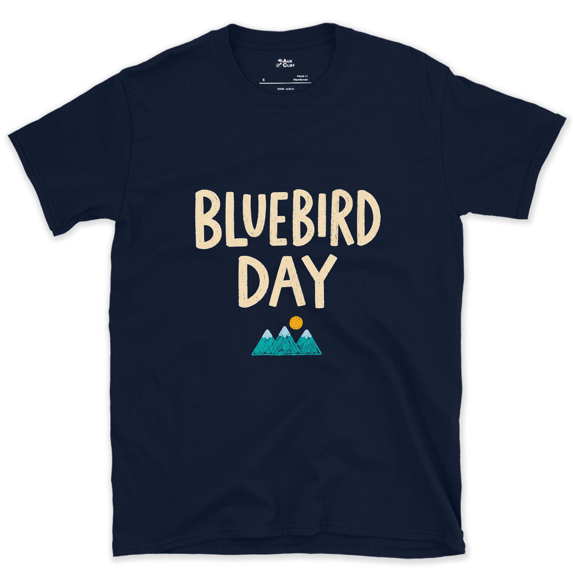 Bluebird Day, Mountains Under a Bright Sun design on a Navy Gildan Softstyle t-shirt