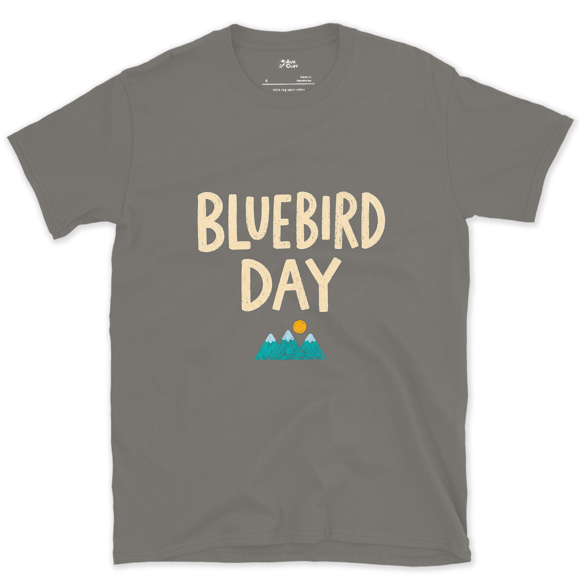 Bluebird Day, Mountains Under a Bright Sun design on a Charcoal Gildan Softstyle t-shirt