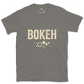 Bokeh, the Shape of Out of Focus Light design on a Charcoal Gildan Softstyle t-shirt