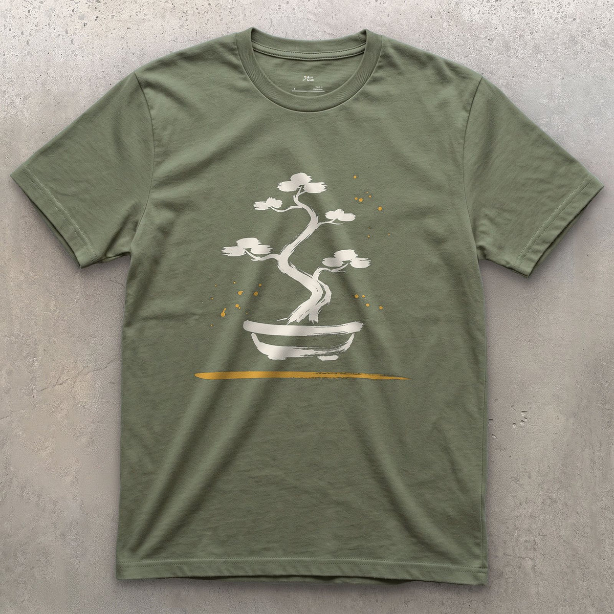 Bonsai Pine design on a Military Green Gildan Softstyle t-shirt
