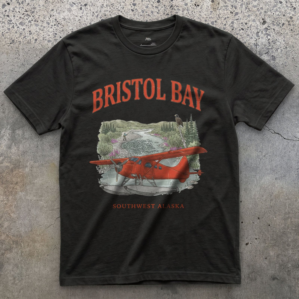Bristol Bay Bush Plane design on a Black Gildan Softstyle t-shirt