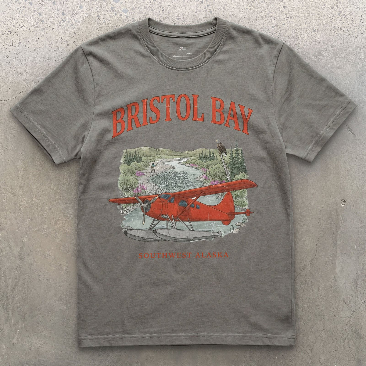 Bristol Bay Bush Plane design on a Charcoal Gildan Softstyle t-shirt