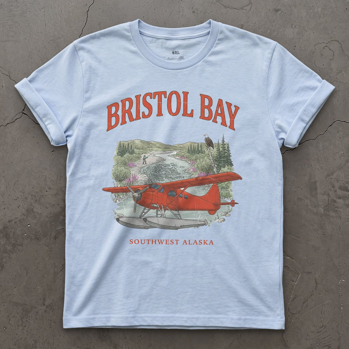 Bristol Bay Bush Plane design on a Light Blue Gildan Softstyle t-shirt