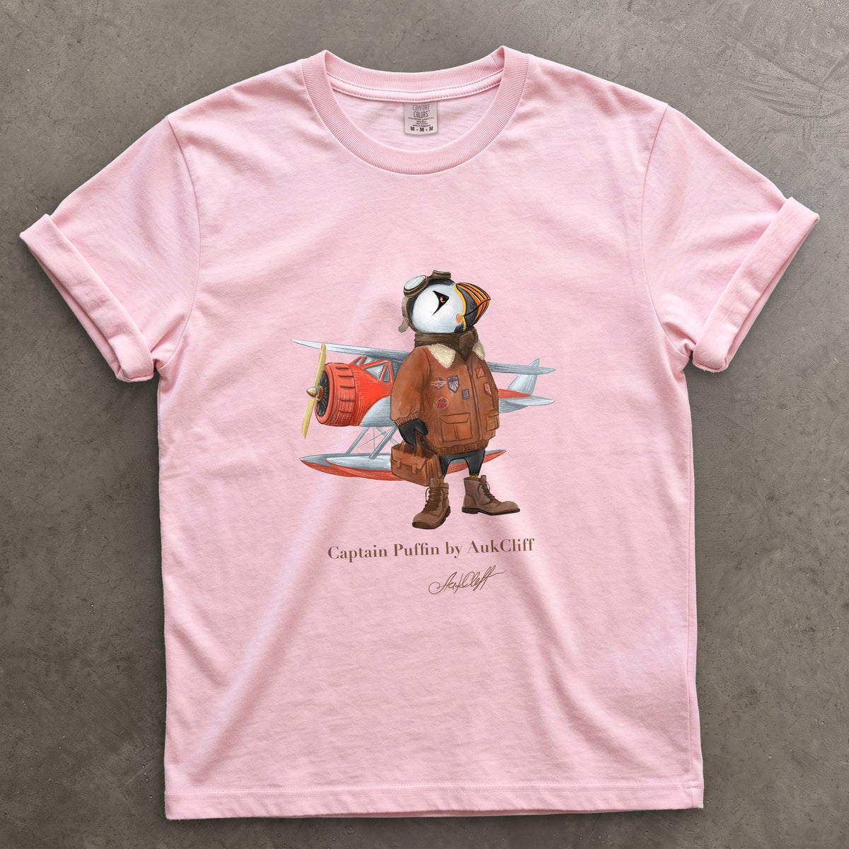 Captain Puffin Bush Pilot on a Blossom Comfort Colors t-shirt