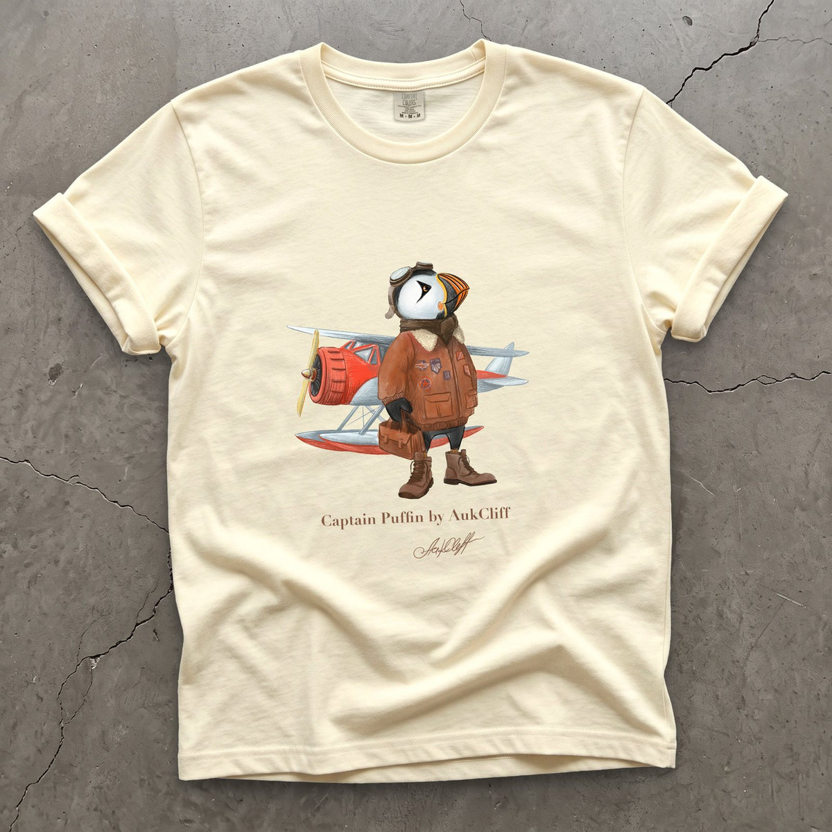 Captain Puffin Bush Pilot on a Ivory Comfort Colors t-shirt