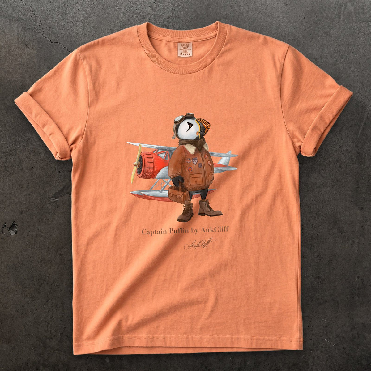 Captain Puffin Bush Pilot on a Terracotta Comfort Colors t-shirt