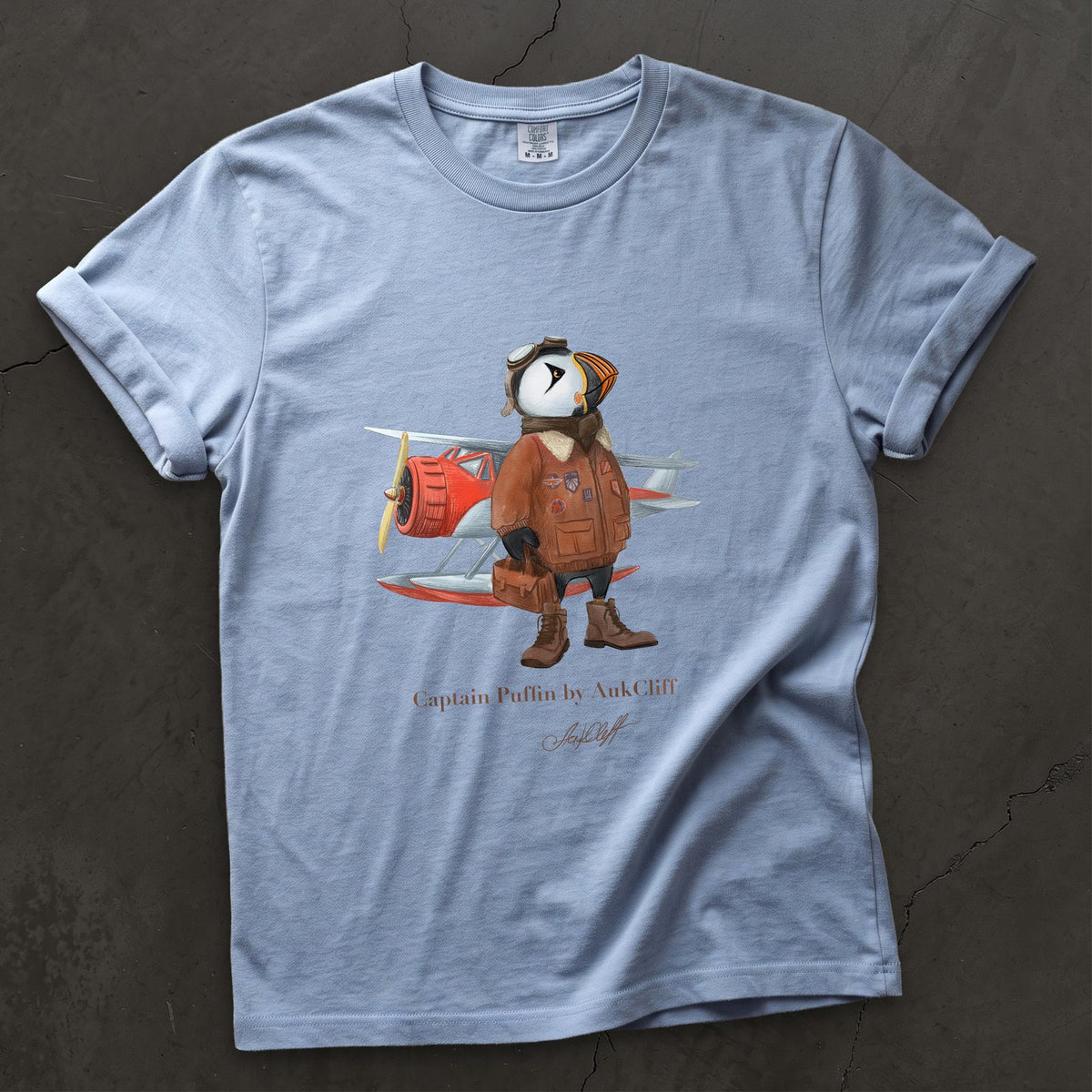 Captain Puffin Bush Pilot on a Washed Denim Comfort Colors t-shirt