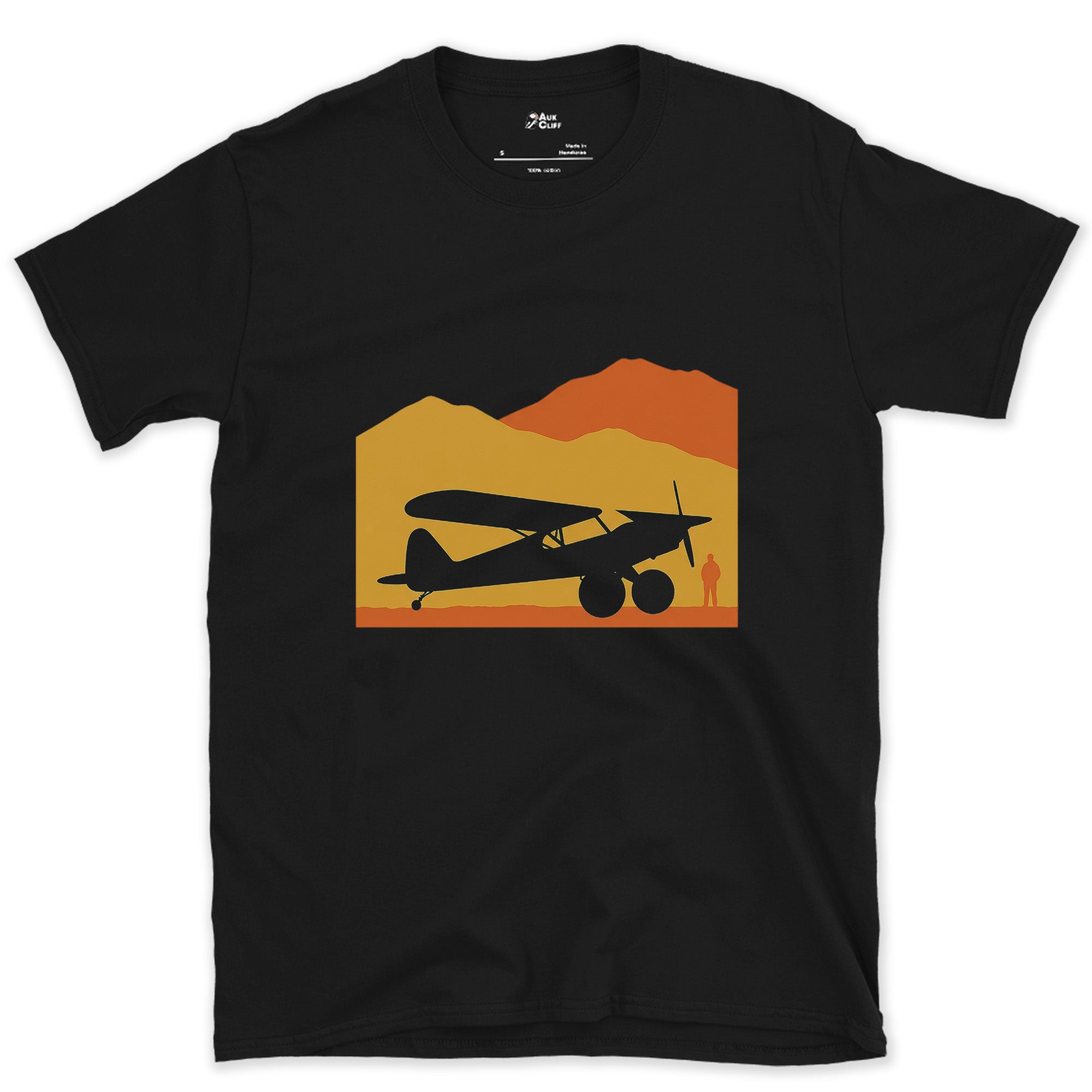 Bush Plane Crossing a Desert Dusk design on a Black Gildan Softstyle t-shirt