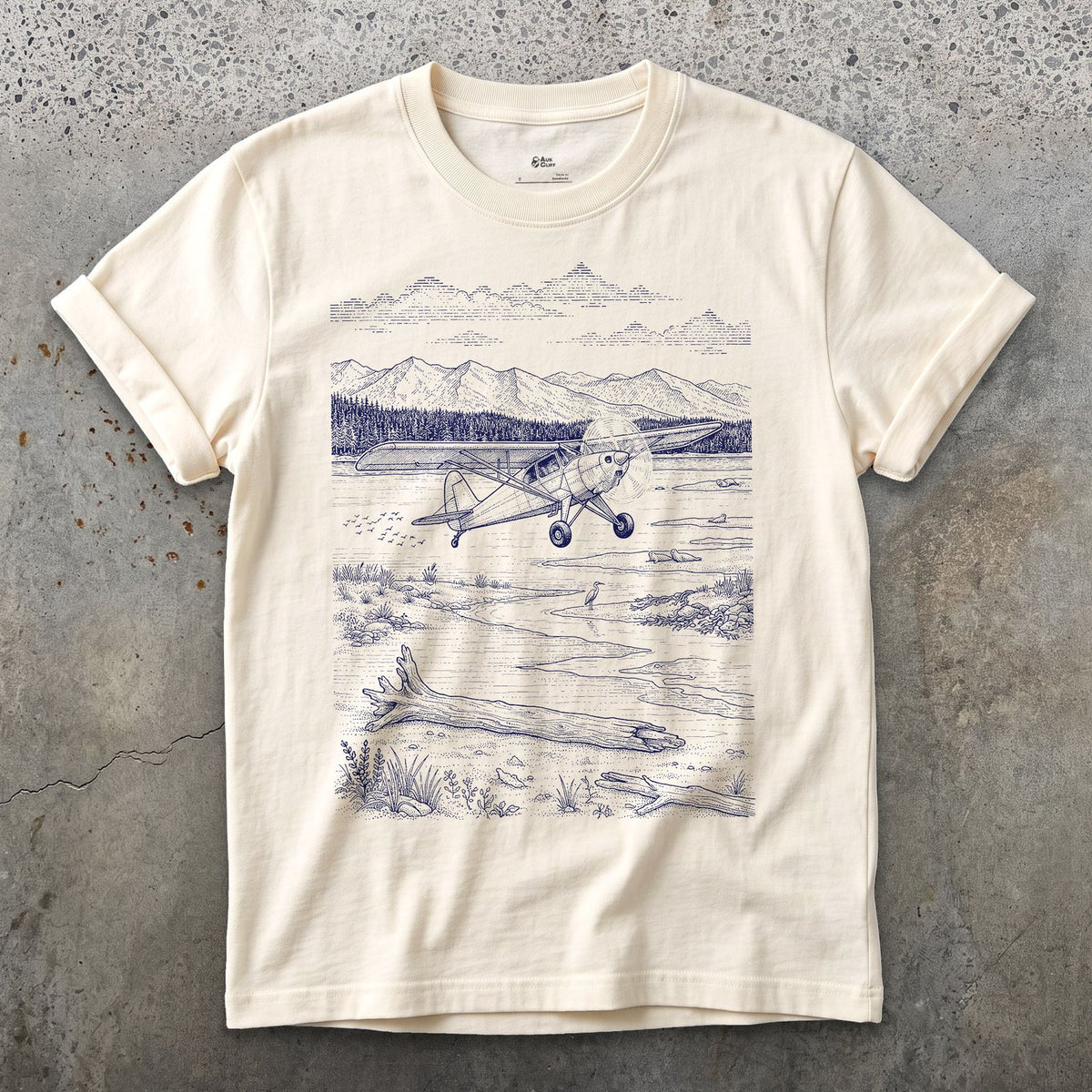 Bush Plane on the Tidal Flat design on a Natural Gildan Softstyle t-shirt