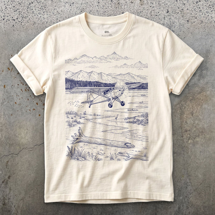 Bush Plane on the Tidal Flat design on a Natural Gildan Softstyle t-shirt
