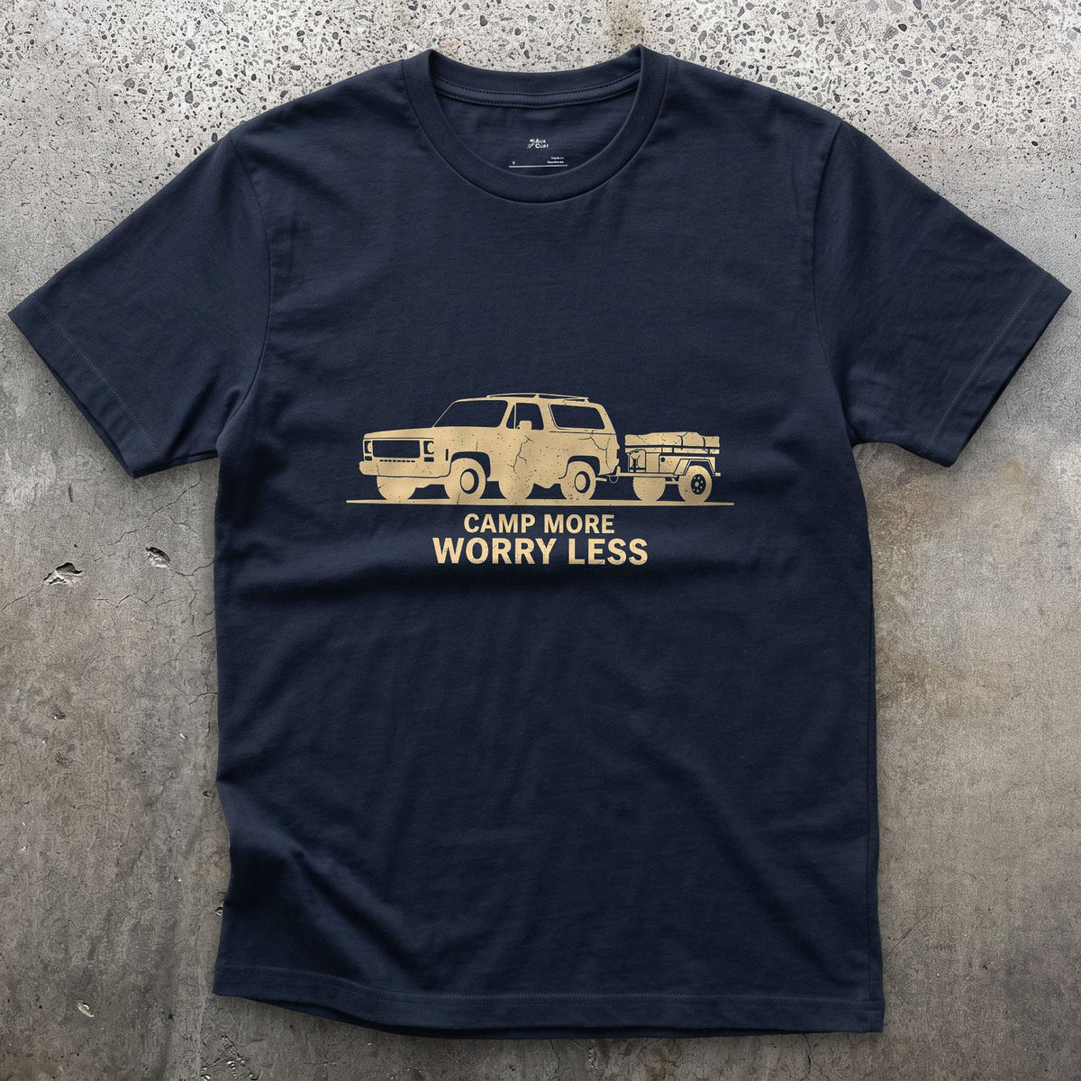 Camp More Worry Less Towing the Cream Trailer design on a Navy Gildan Softstyle t-shirt