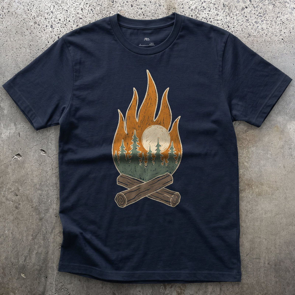 Pines and Sunrise Inside the Flame design on a Navy Gildan Softstyle t-shirt