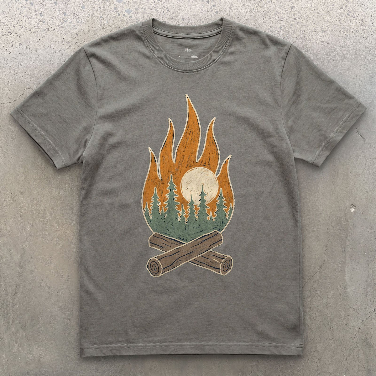 Pines and Sunrise Inside the Flame design on a Charcoal Gildan Softstyle t-shirt