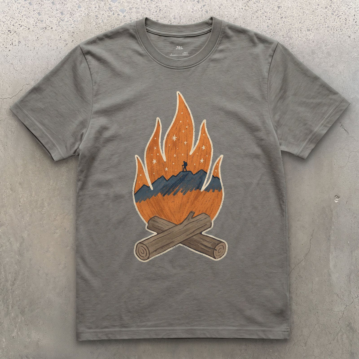 A Lone Hiker Held by Firelight design on a Charcoal Gildan Softstyle t-shirt