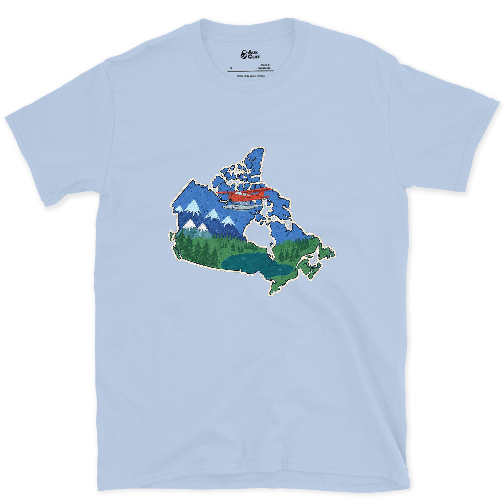 Forest and Peak Grown Into Canada design on a Light Blue Gildan Softstyle t-shirt