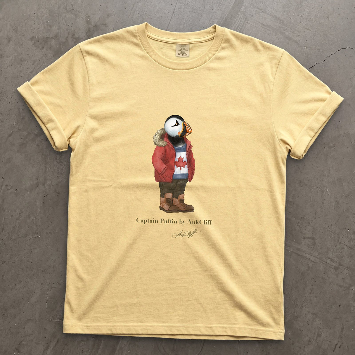Captain Puffin Canada Trailkeeper on a Butter Comfort Colors t-shirt