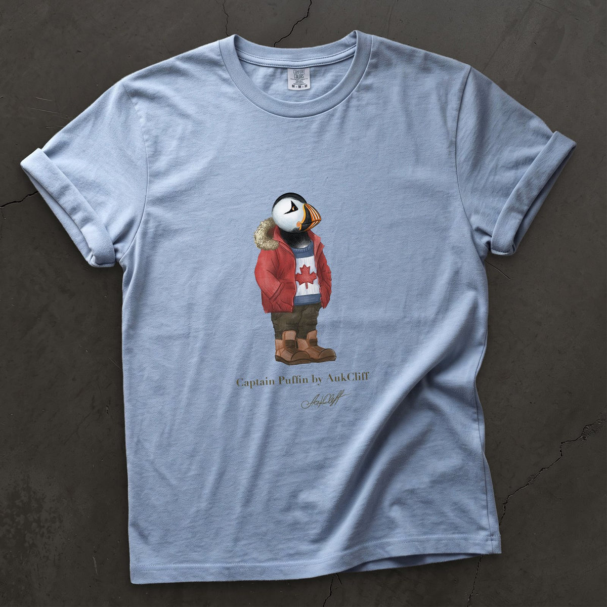 Captain Puffin Canada Trailkeeper on a Washed Denim Comfort Colors t-shirt