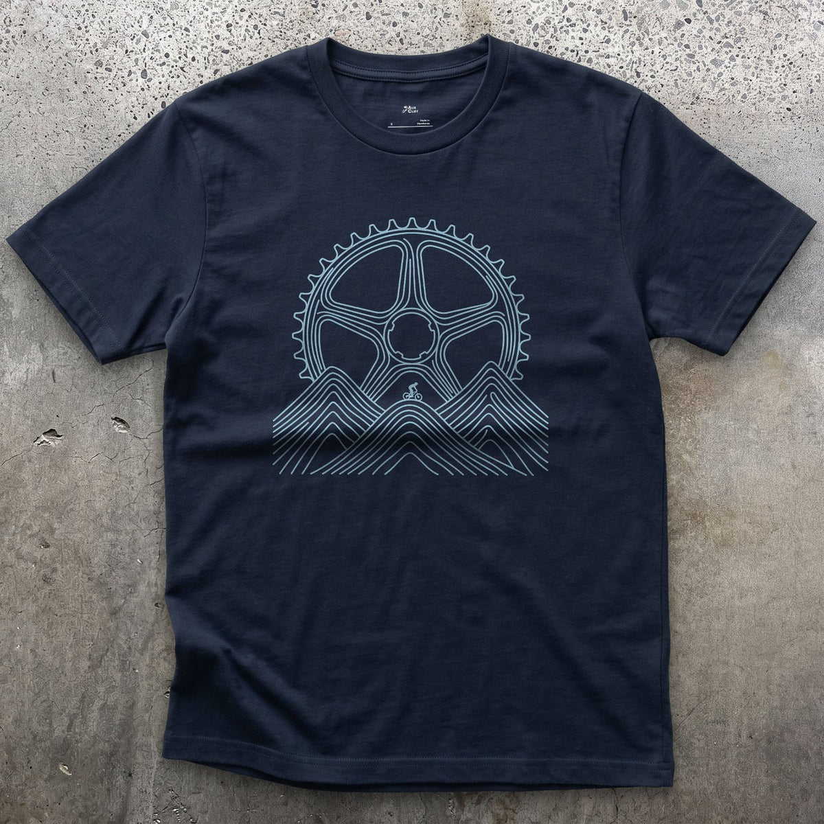 Dwarfed by Contour Lines, Chainring Sunrise design on a Navy Gildan Softstyle t-shirt