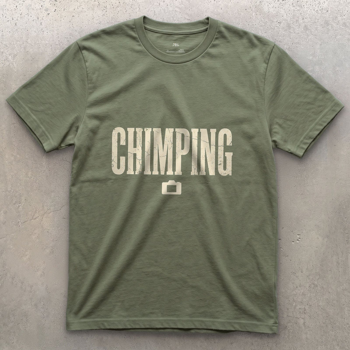 Chimping, Checking the Camera Screen design on a Military Green Gildan Softstyle t-shirt