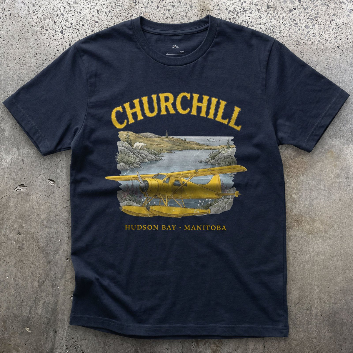 Churchill Bush Plane design on a Navy Gildan Softstyle t-shirt