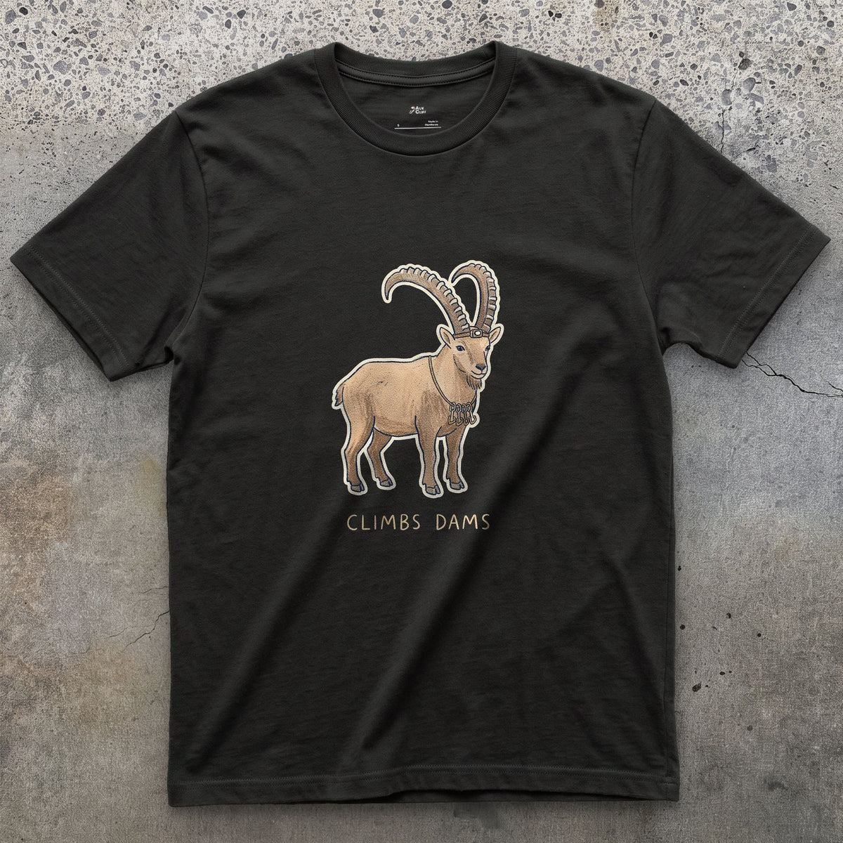 Climbs Dams, Ibex With Curved Horns design on a Black Gildan Softstyle t-shirt