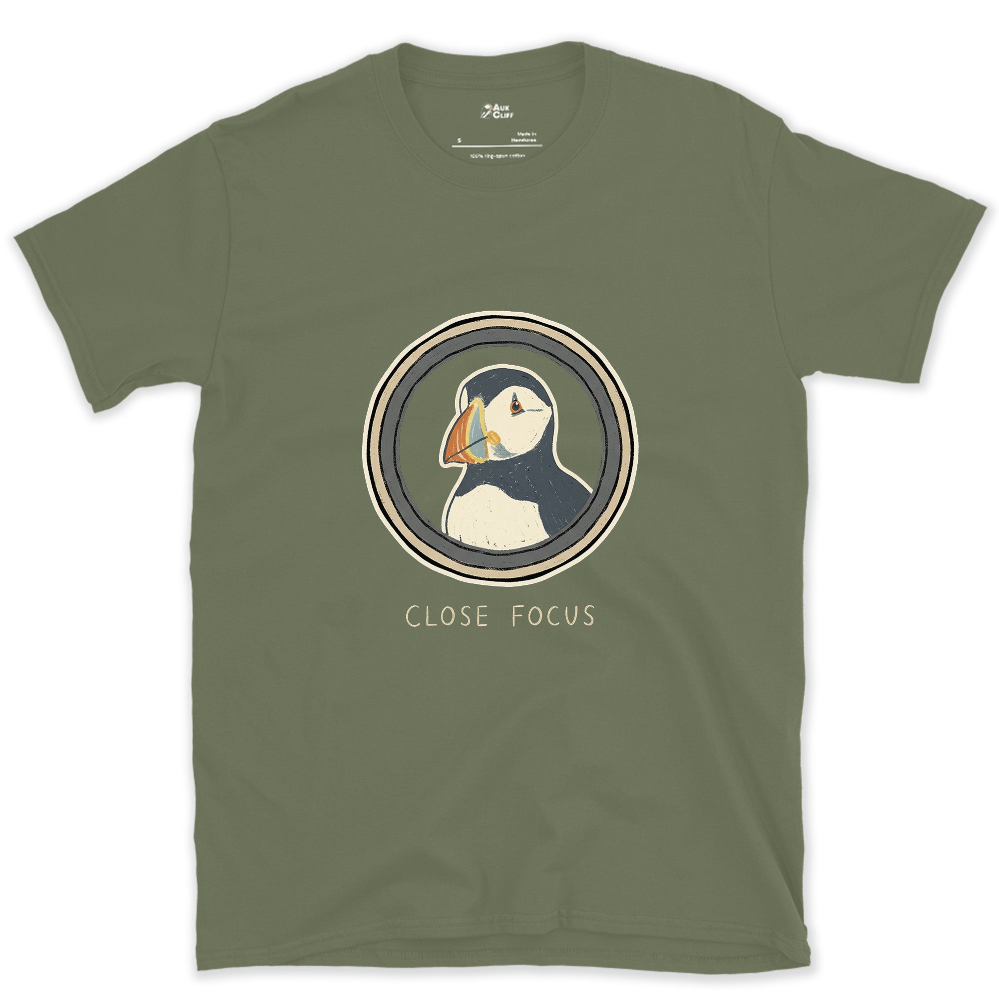 Close Focus on a Puffin design on a Military Green Gildan Softstyle t-shirt