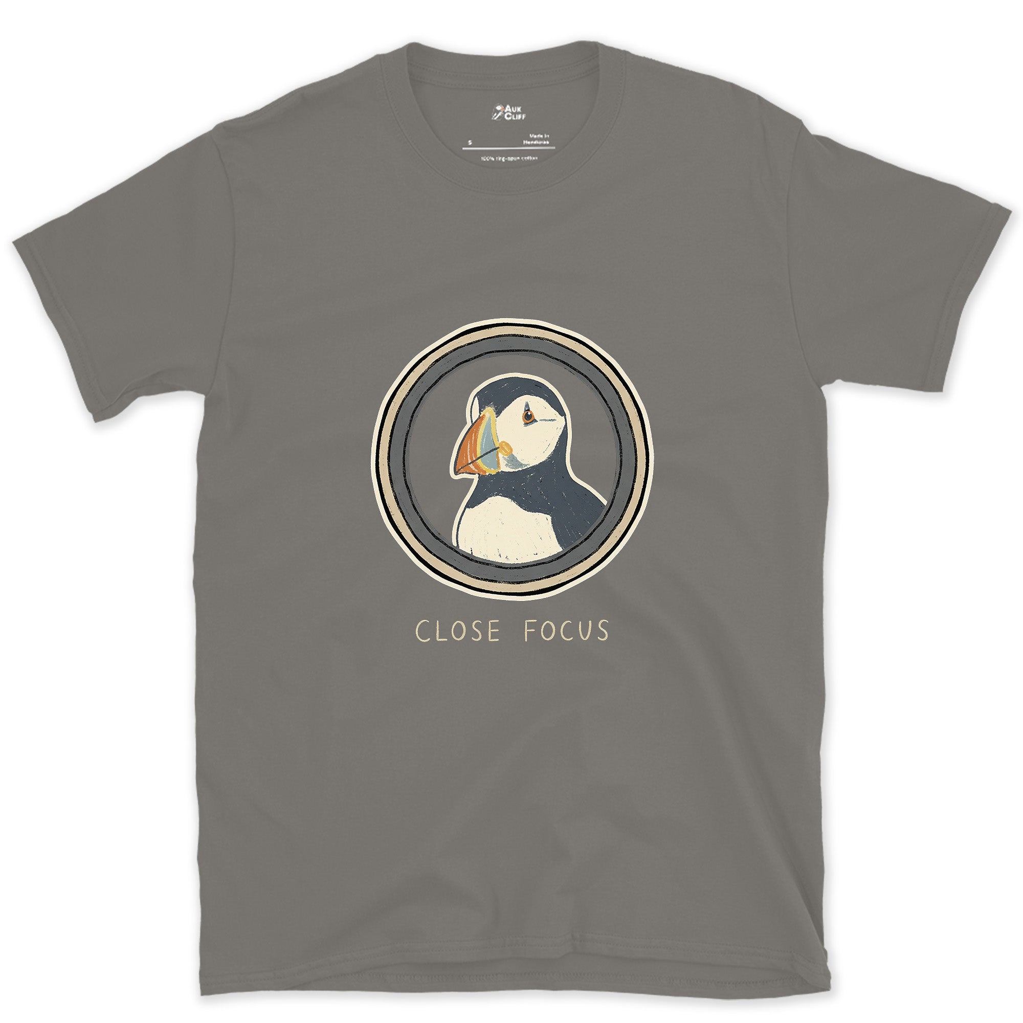 Close Focus on a Puffin design on a Charcoal Gildan Softstyle t-shirt