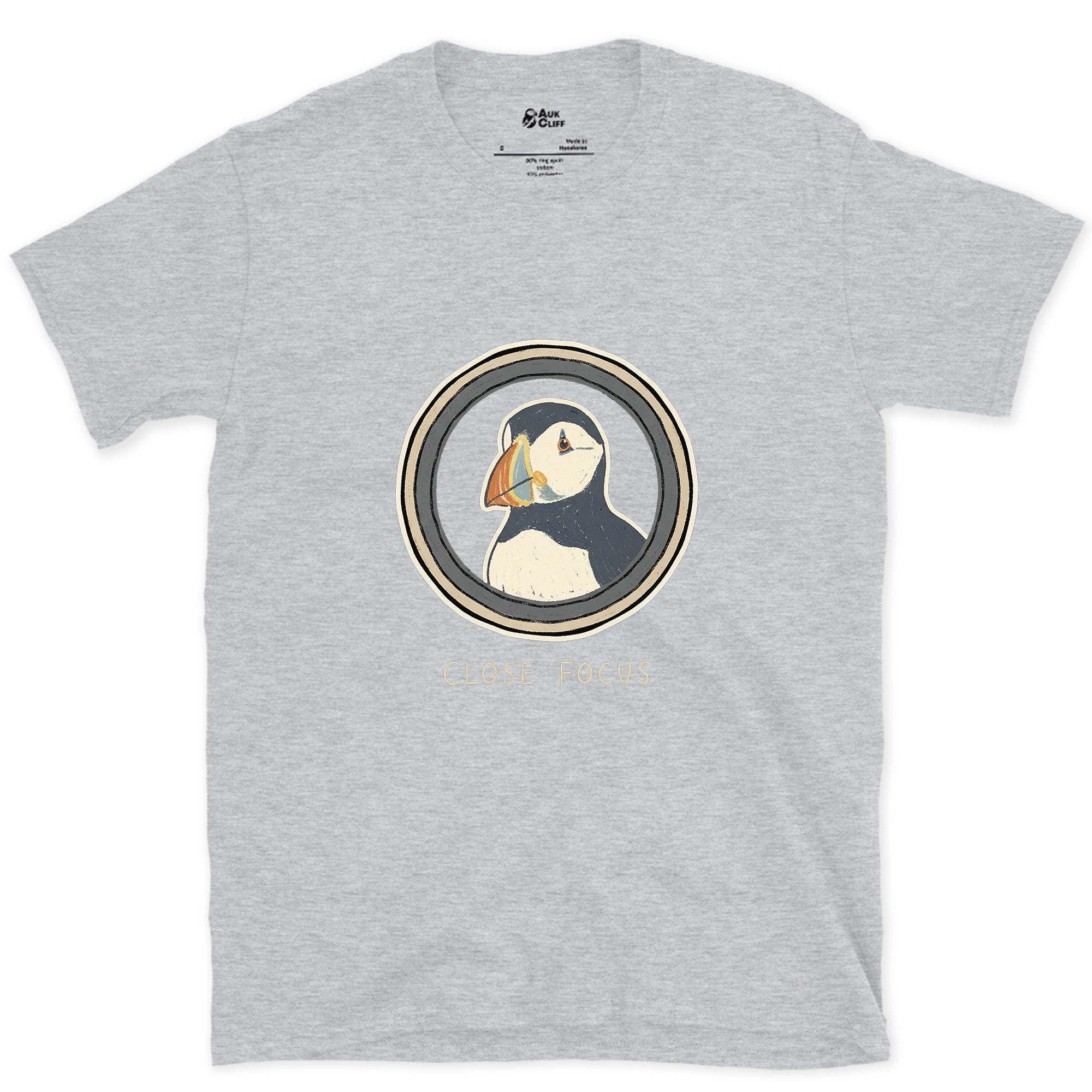 Close Focus on a Puffin design on a Sport Grey Gildan Softstyle t-shirt