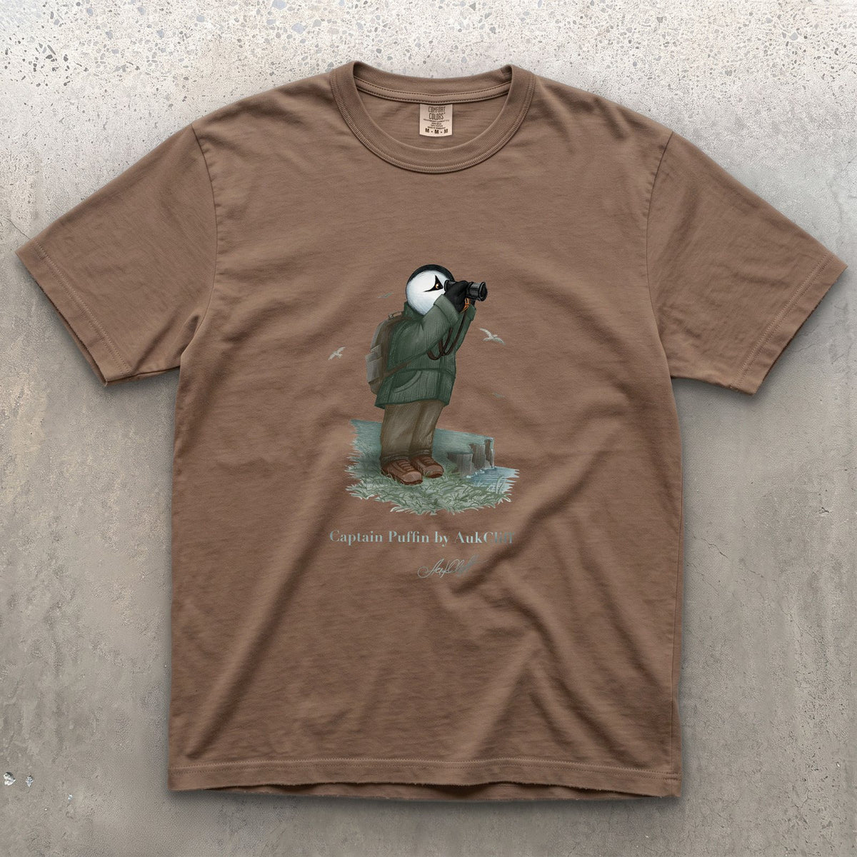 Captain Puffin Coastal Birder on a Espresso Comfort Colors t-shirt