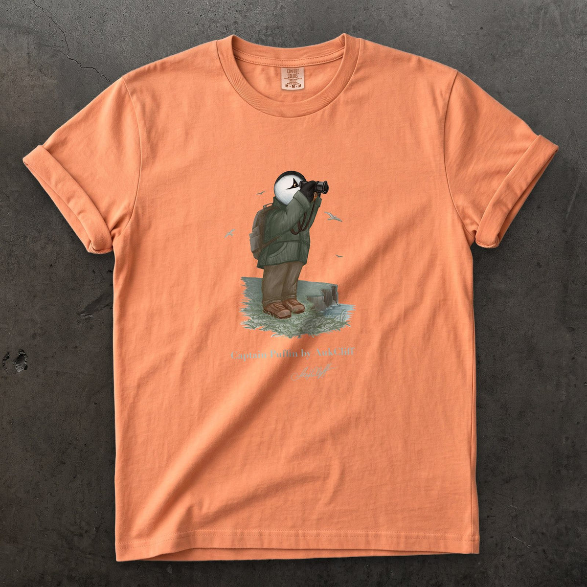 Captain Puffin Coastal Birder on a Terracotta Comfort Colors t-shirt