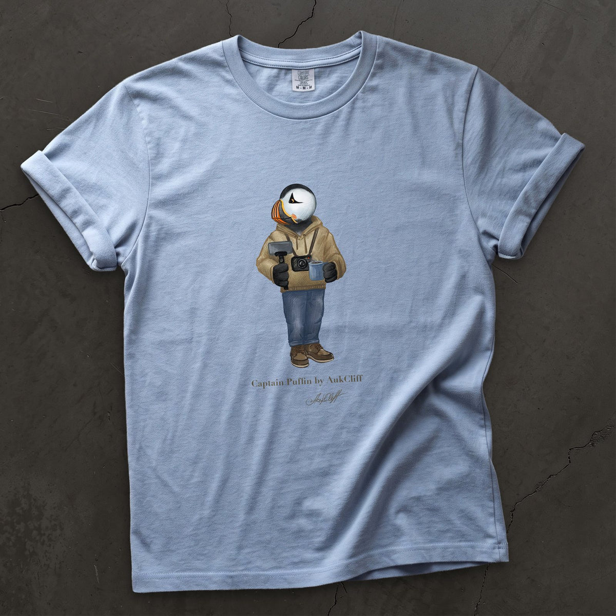 Captain Puffin Content Creator on a Washed Denim Comfort Colors t-shirt