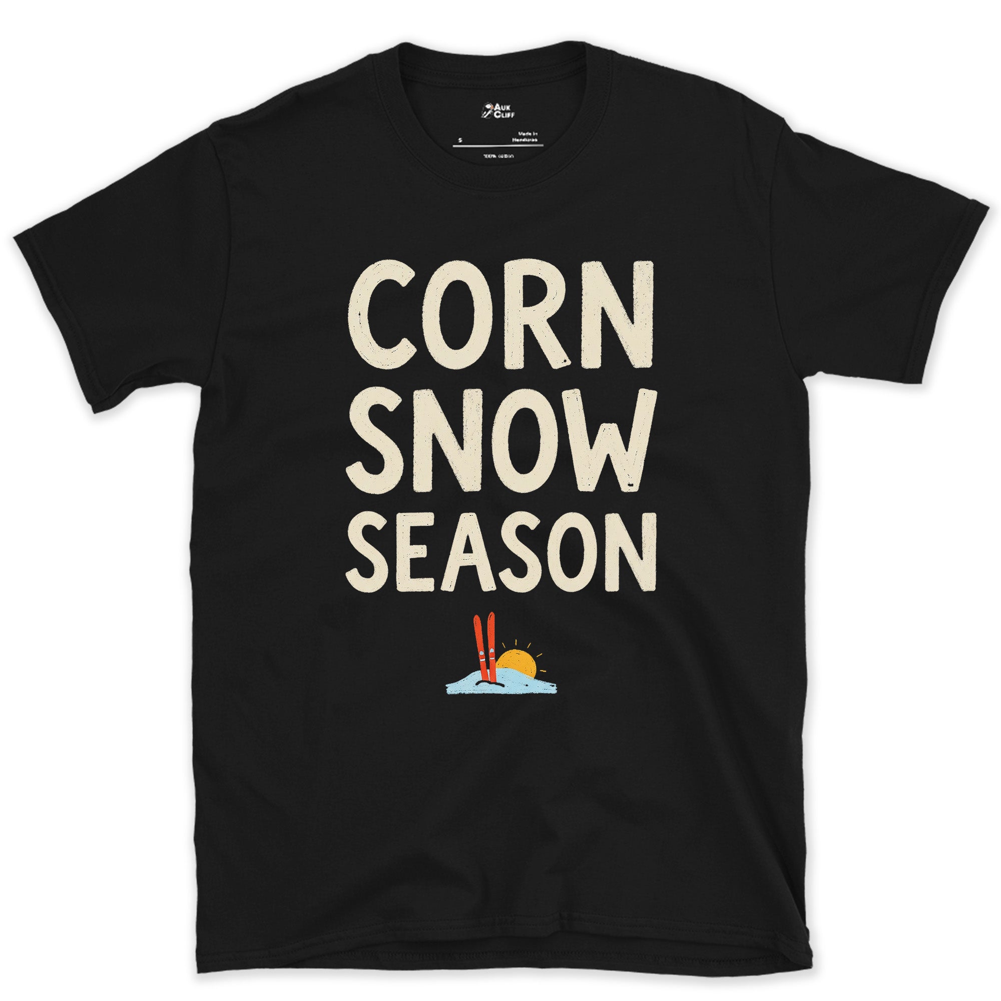 Corn Snow Season, Skis Under a Low Sun design on a Black Gildan Softstyle t-shirt