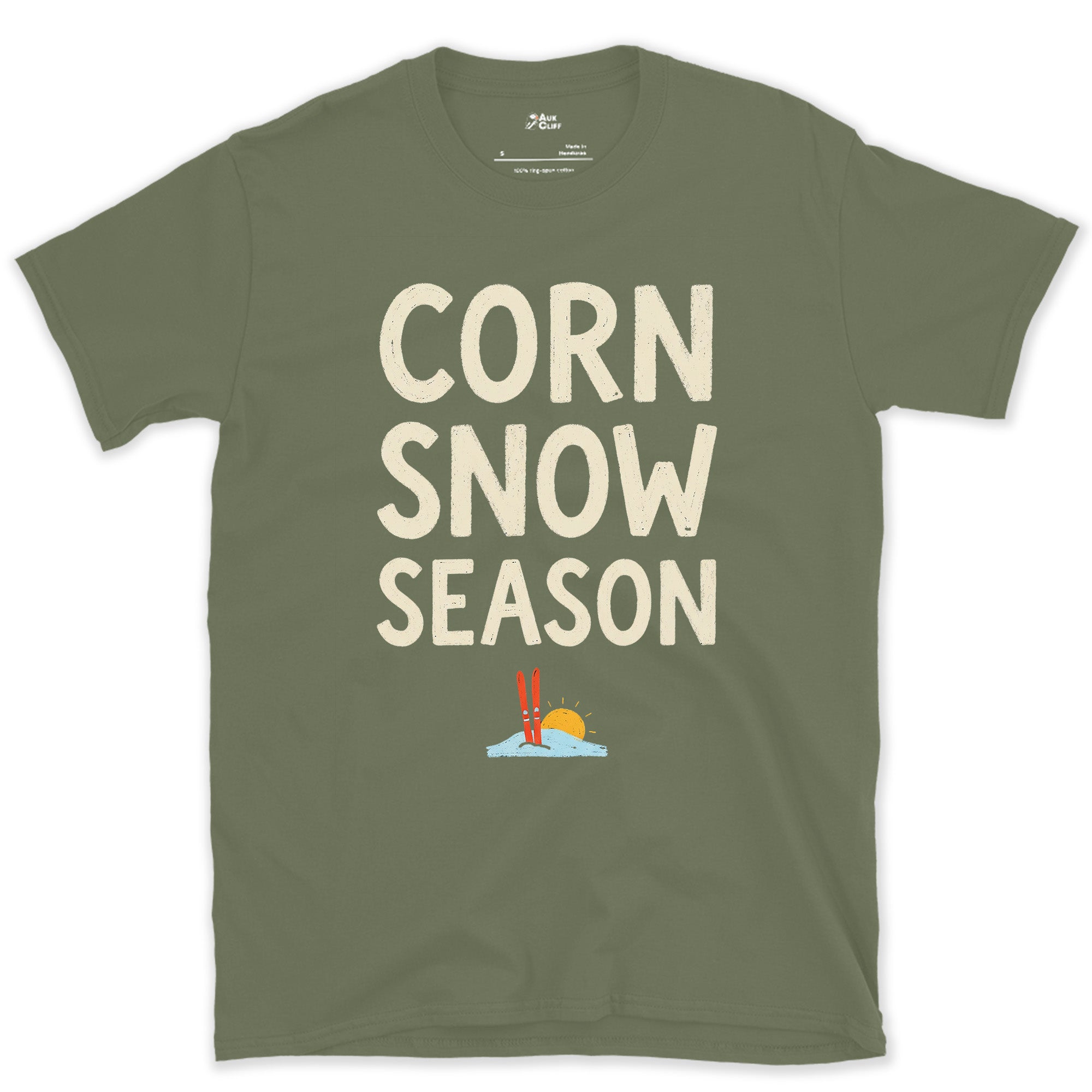 Corn Snow Season, Skis Under a Low Sun design on a Military Green Gildan Softstyle t-shirt