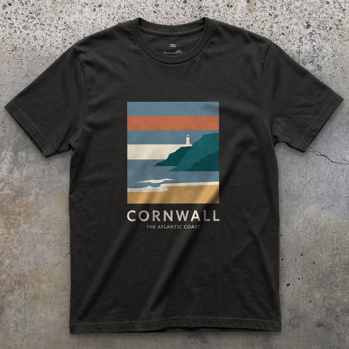Lighthouse Above the Cornish Coast design on a Black Gildan Softstyle t-shirt