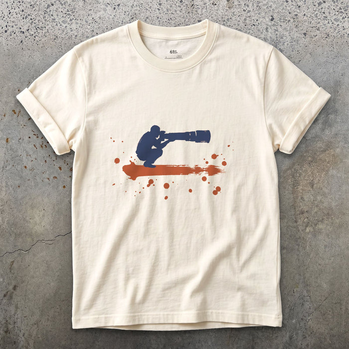 Crouched Behind the Lens design on a Natural Gildan Softstyle t-shirt