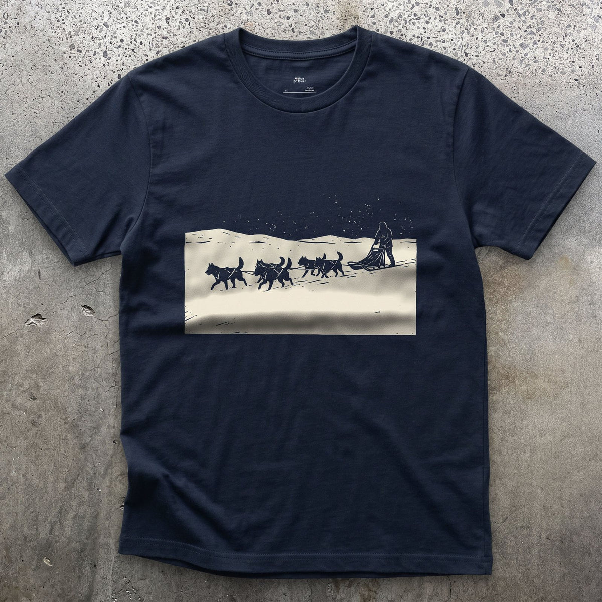 Dog Sled Team Running in Formation design on a Navy Gildan Softstyle t-shirt