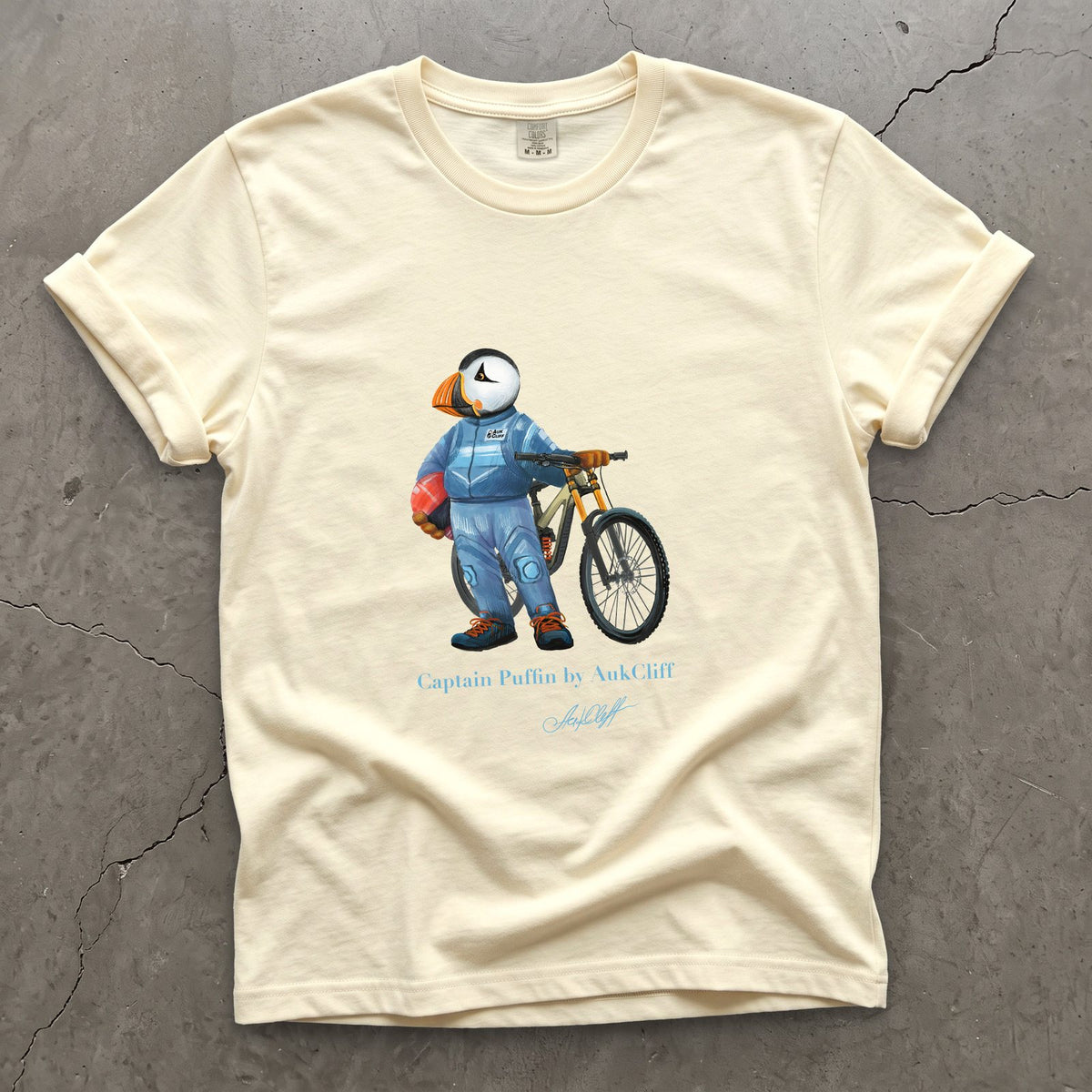 Captain Puffin Downhill Mountain Biker on a Ivory Comfort Colors t-shirt