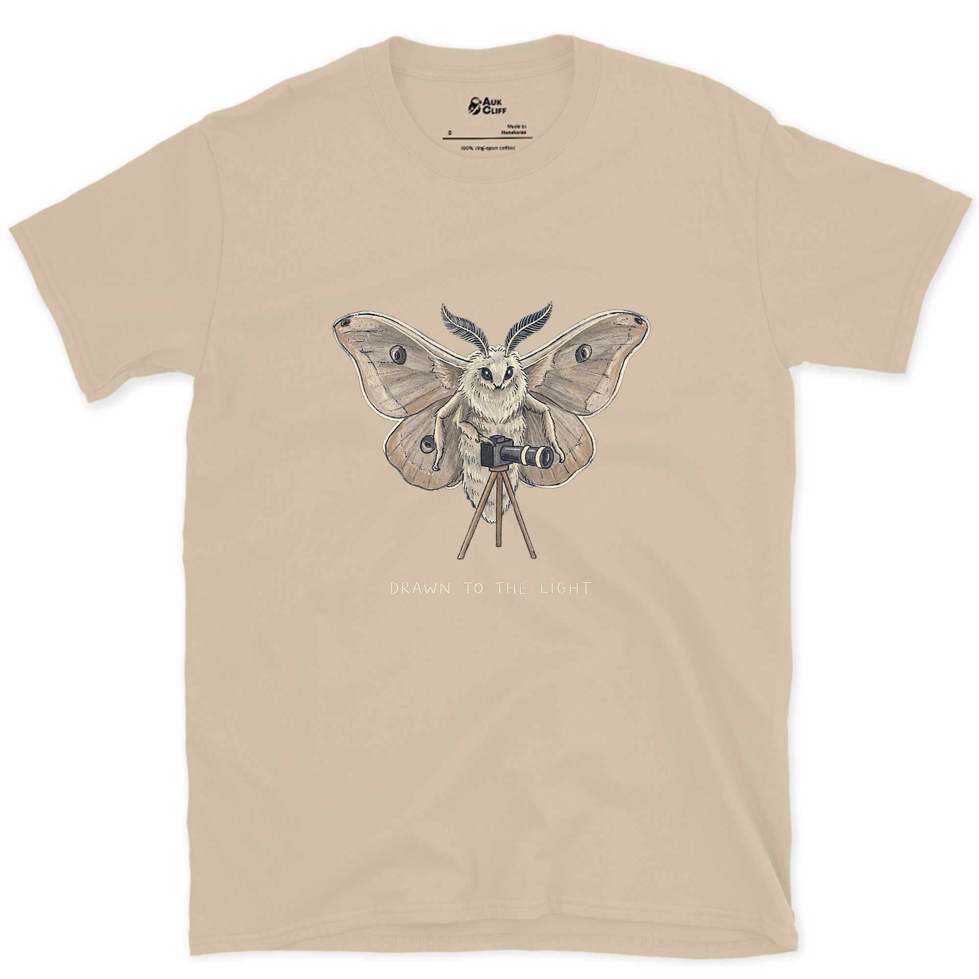 Drawn to the Light, Moth design on a Sand Gildan Softstyle t-shirt