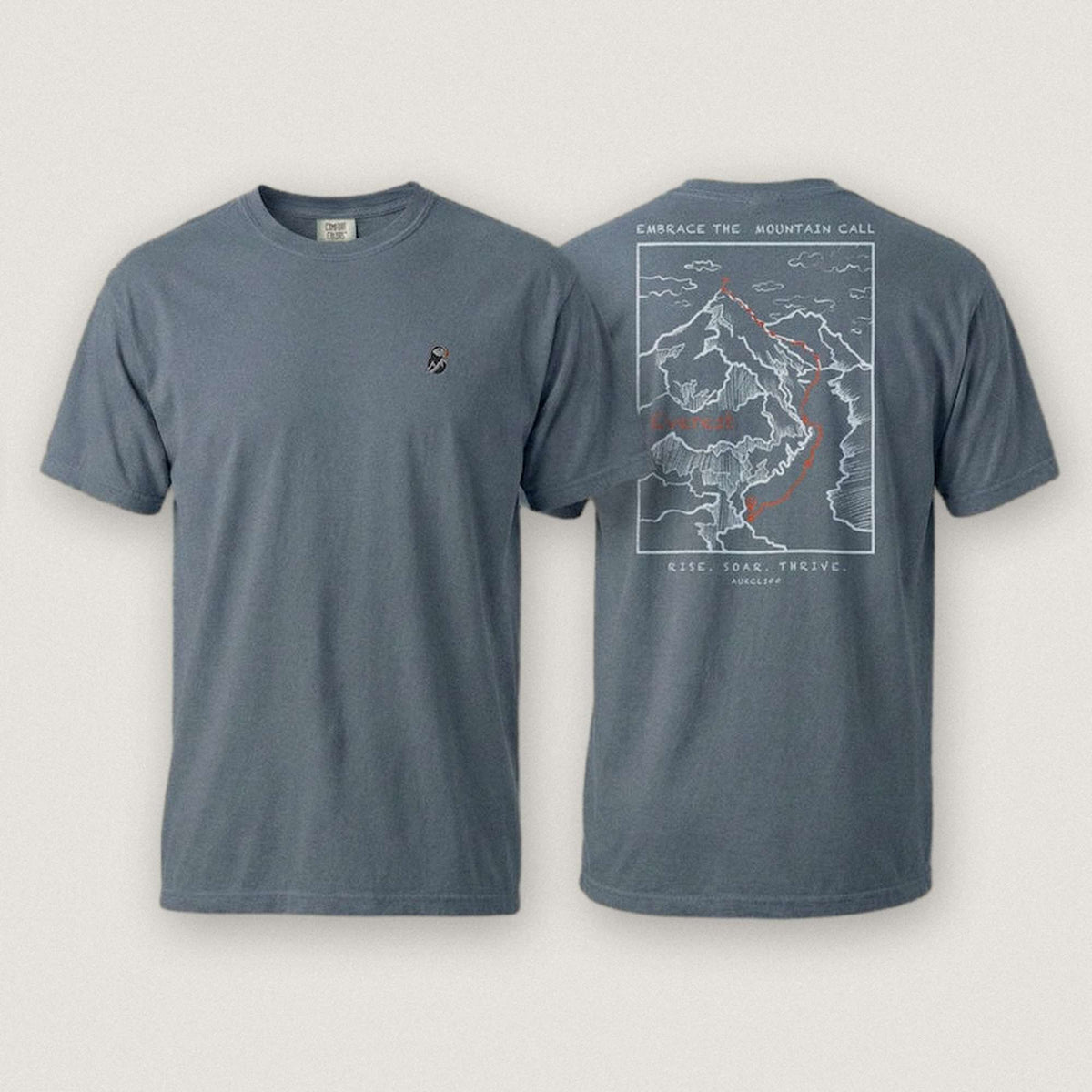 AukCliff Everest tee in Blue Jean, summit-route line art across the back