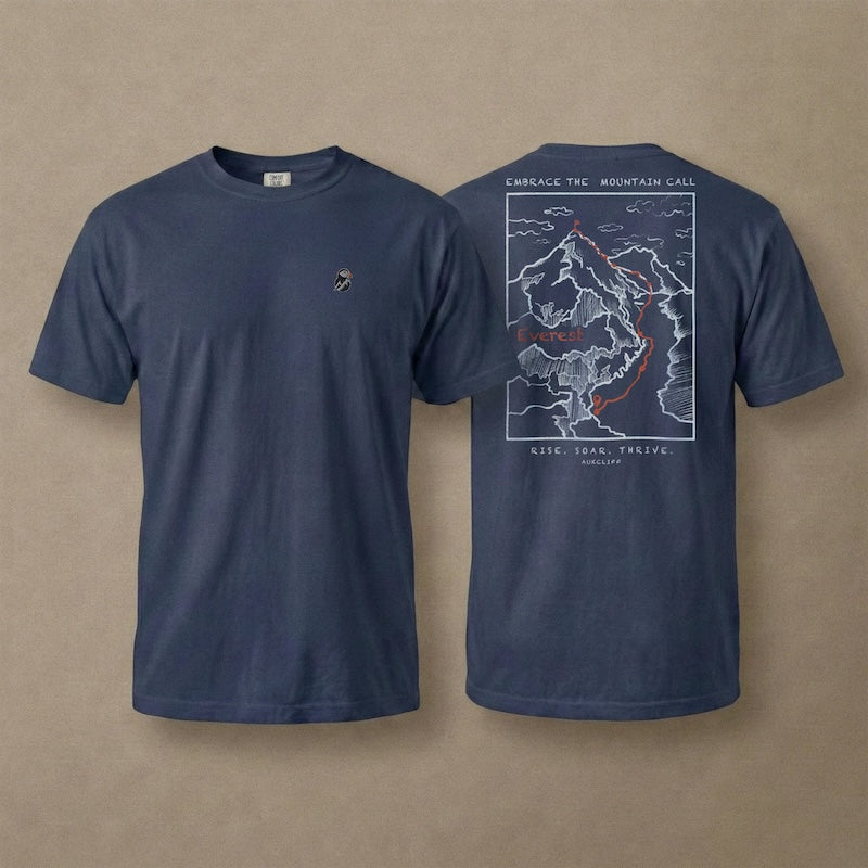 AukCliff Everest tee in True Navy, hand-drawn summit-route line art across the back