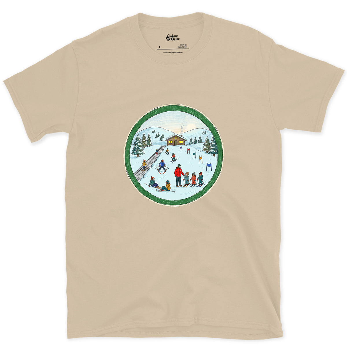 Every Skier Starts on the Green Circle design on a Sand Gildan Softstyle t-shirt