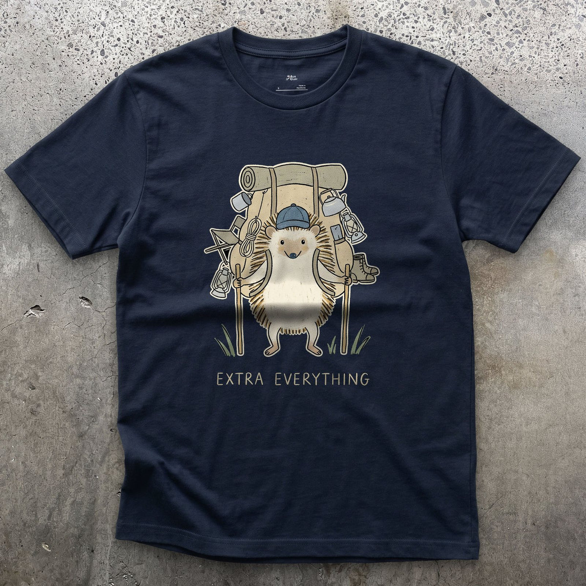 Never Packs Light, Hedgehog Hiker design on a Navy Gildan Softstyle t-shirt