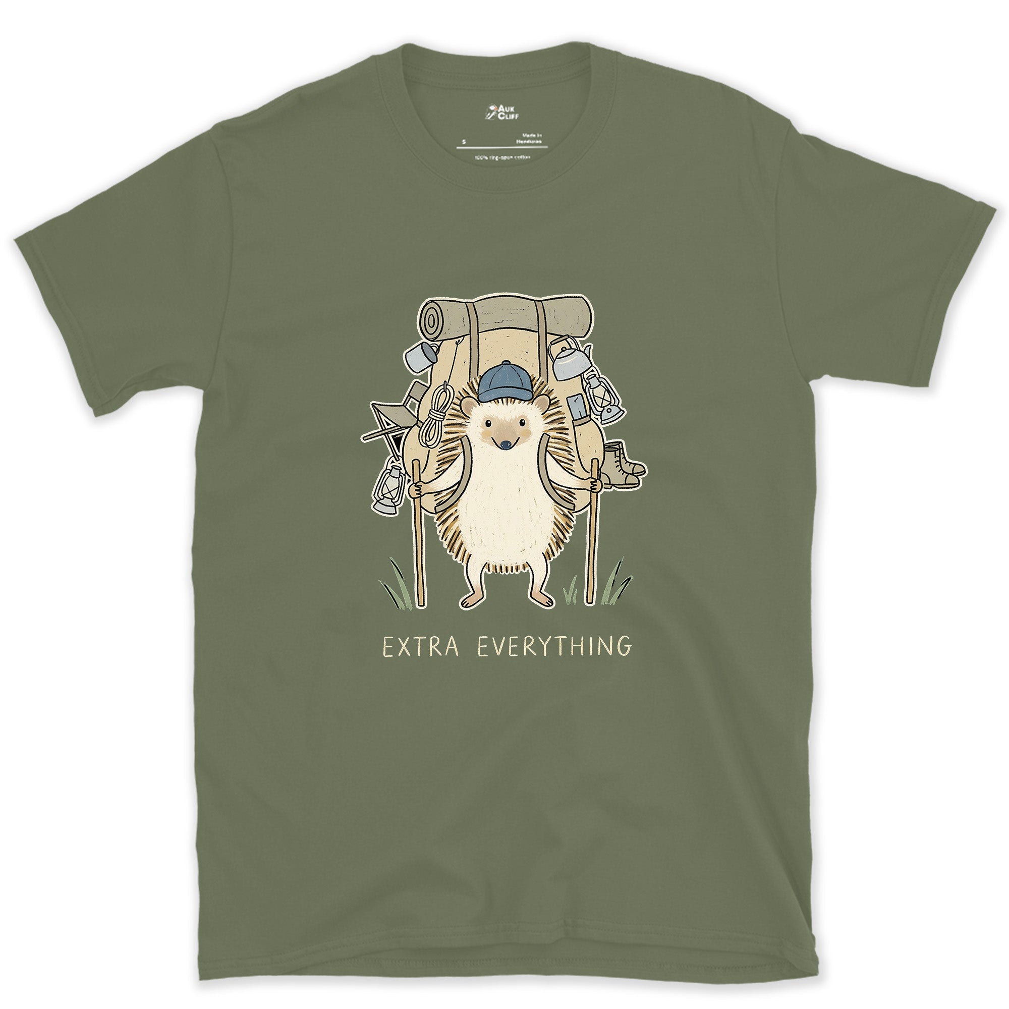 Never Packs Light, Hedgehog Hiker design on a Military Green Gildan Softstyle t-shirt