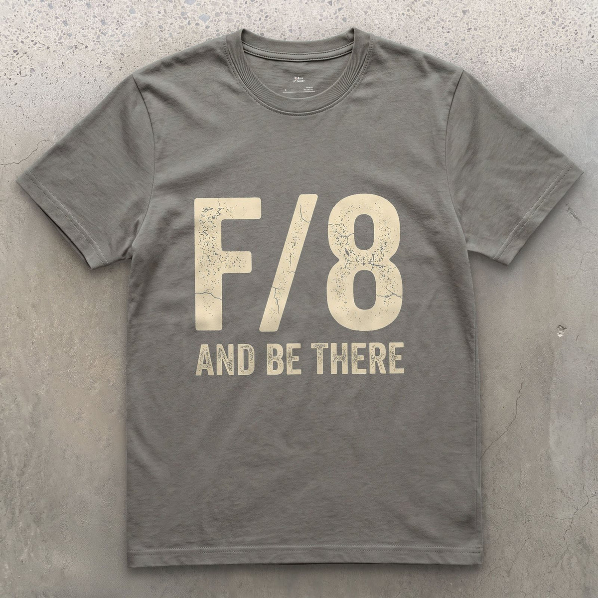 F/8 and Be There, a Photographer's Motto design on a Charcoal Gildan Softstyle t-shirt