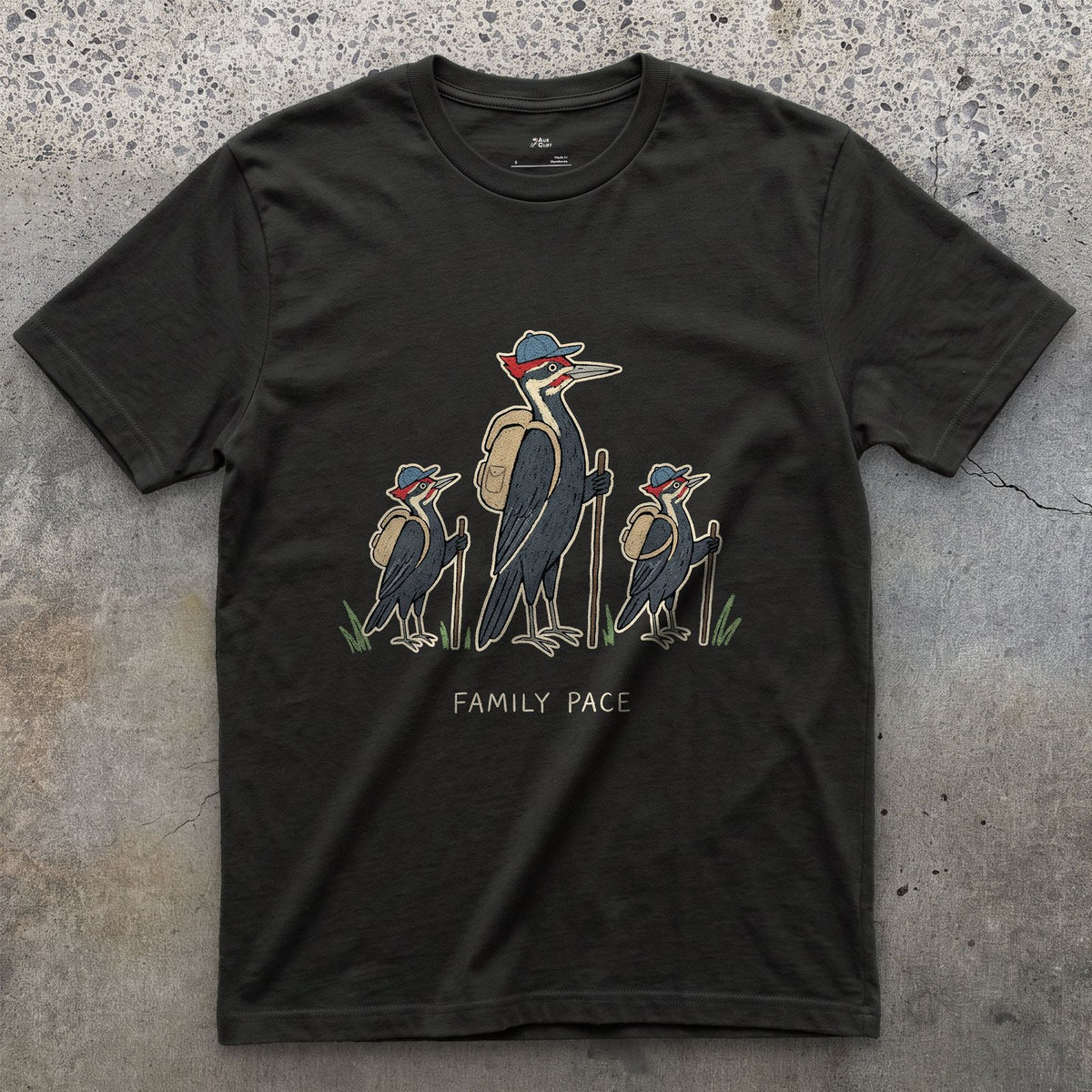 Woodpeckers Slowing to a Family Pace design on a Black Gildan Softstyle t-shirt