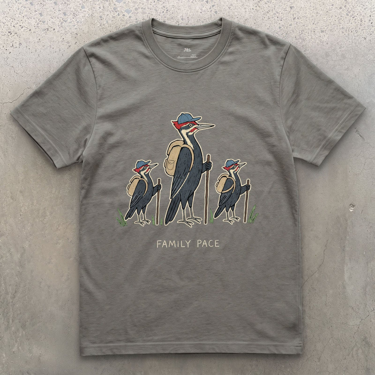 Woodpeckers Slowing to a Family Pace design on a Charcoal Gildan Softstyle t-shirt